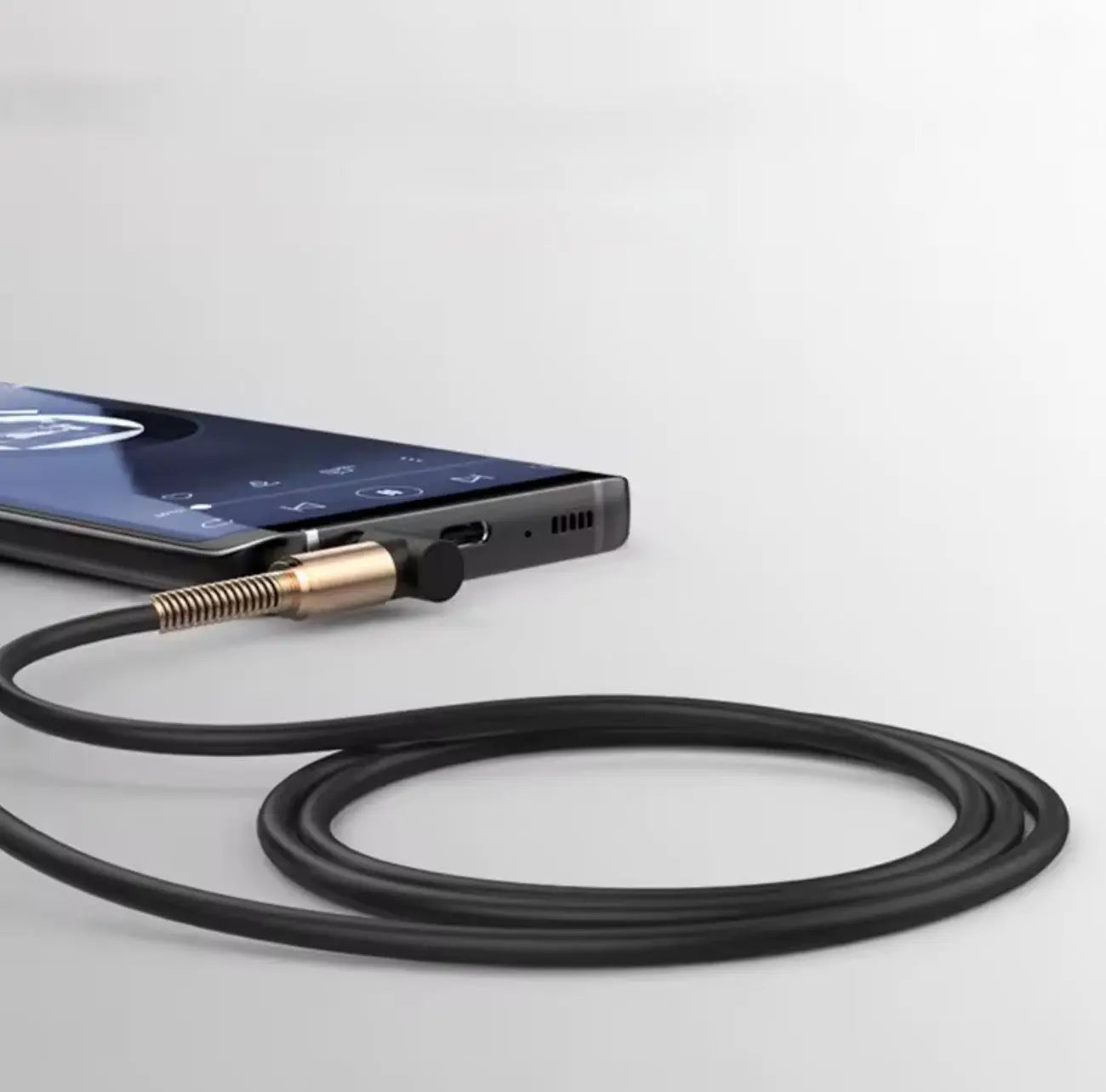 Câble Audio Jack 3.5mm Mâle ↔ Mâle – Plaqué Or, Design Ressort Mobile City